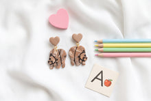 Load image into Gallery viewer, Marbled brown bear earrings with outlined details and brown heart tops
